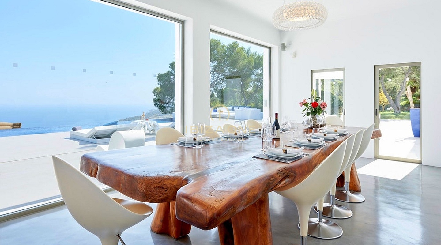 De luxe villa The Palms te huur - Ongeëvenaard uitzicht op zee en de baai vanaf de top van Es Cubells, Ibiza