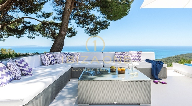 De luxe villa The Palms te huur - Ongeëvenaard uitzicht op zee en de baai vanaf de top van Es Cubells, Ibiza