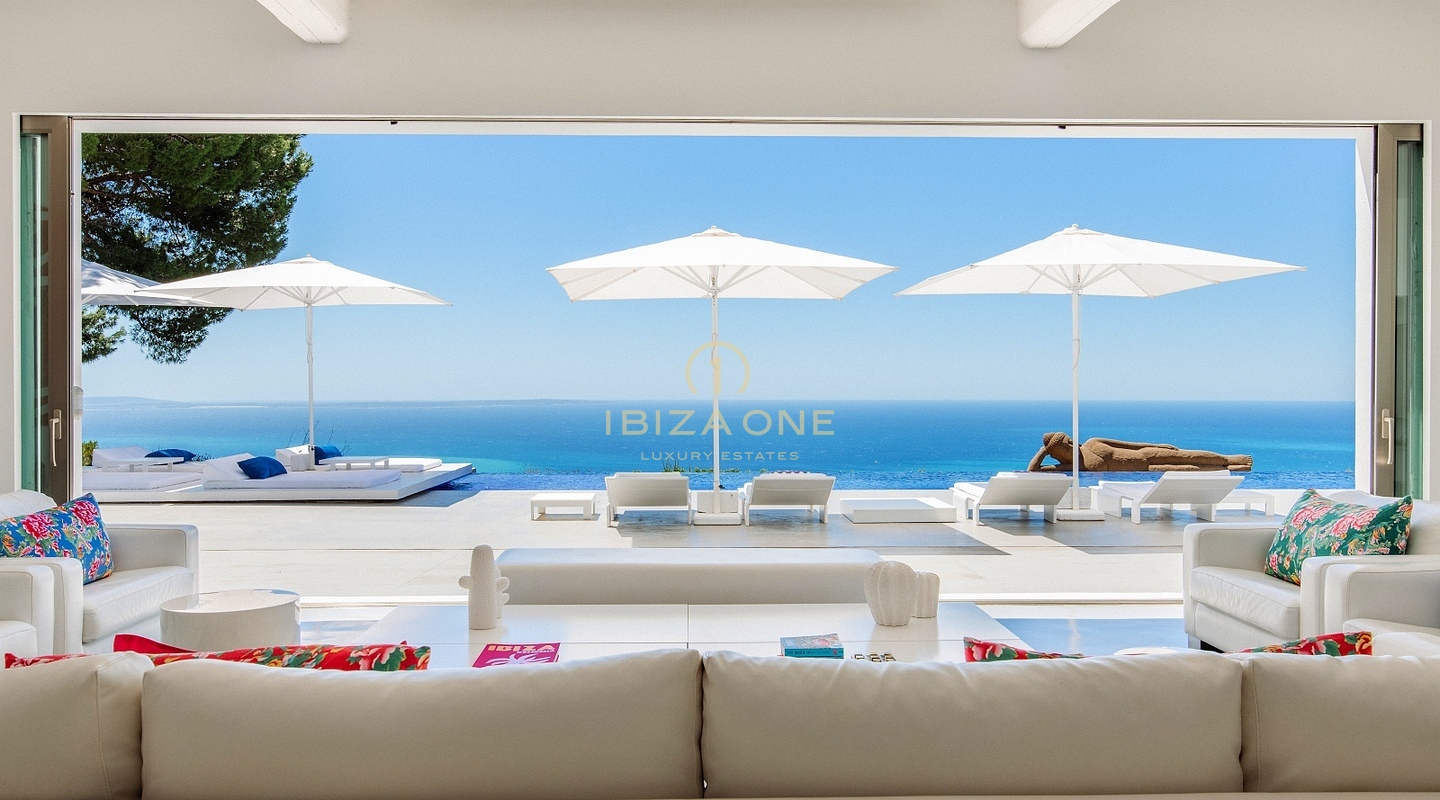 De luxe villa The Palms te huur - Ongeëvenaard uitzicht op zee en de baai vanaf de top van Es Cubells, Ibiza