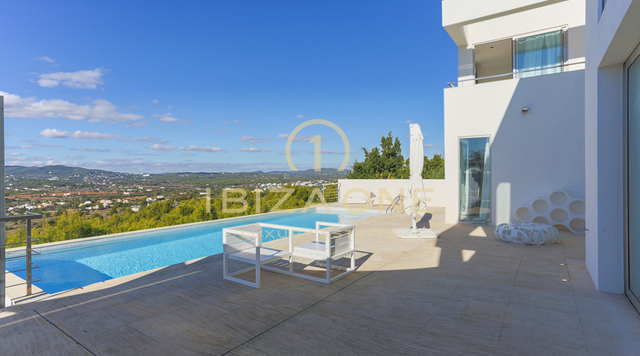 Villa de lujo contemporánea con impresionantes vistas y puesta de sol en Can Rimbau en alquiler, Ibiza
