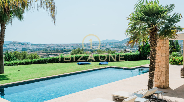 Modern luxury villa in the prestigious gated community of Can Rimbau with fantastic panoramic views for rent, Ibiza