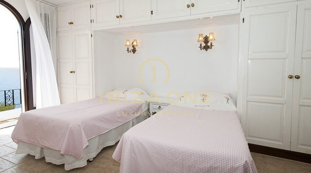 Luxury first line sea villa in Es Cubells with direct access to the beach - waterfront property
