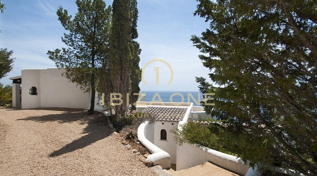 Luxury first line sea villa in Es Cubells with direct access to the beach - waterfront property