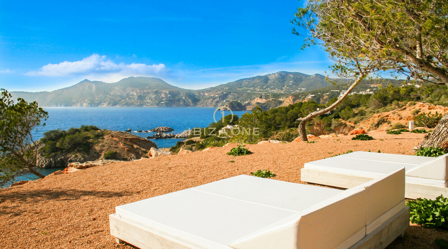 Luxury seafront villa with 350 meters sea frontage and sea access for rent in the prime location of Porroig, Ibiza