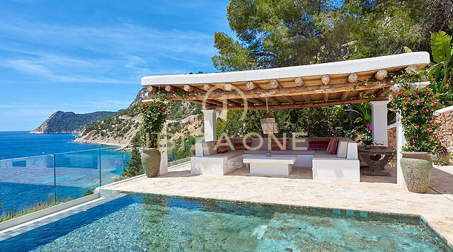 Wonderful first line villa with sea access and private beach for sale
