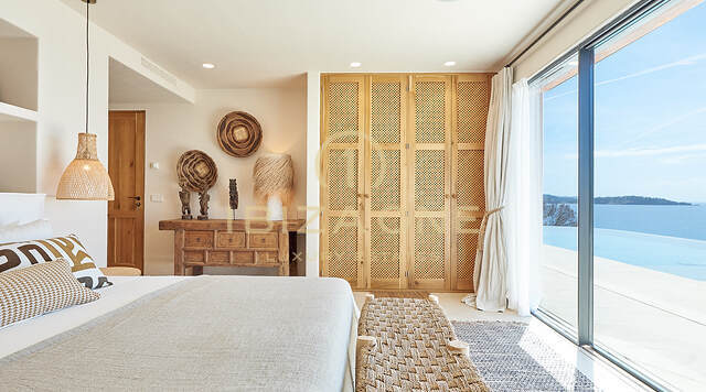 Wonderful first line villa with sea access and private beach for sale