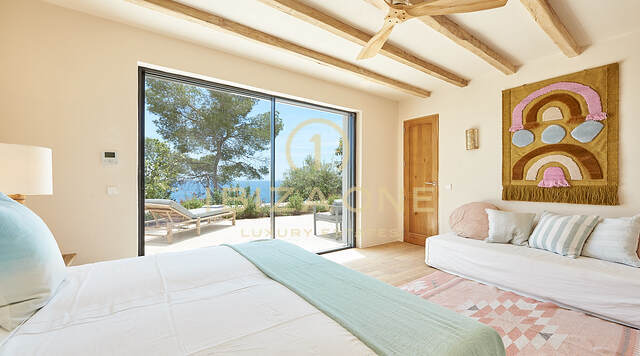 Wonderful first line villa with sea access and private beach for sale