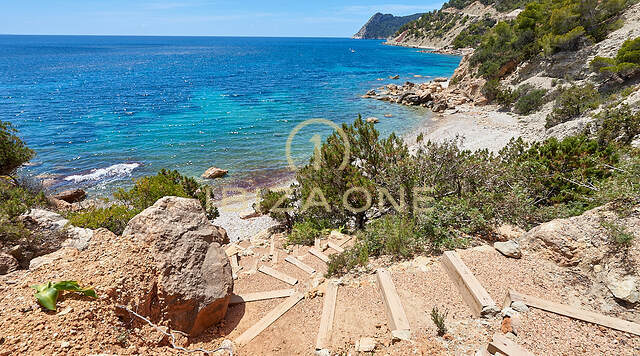 Wonderful first line villa with sea access and private beach for sale