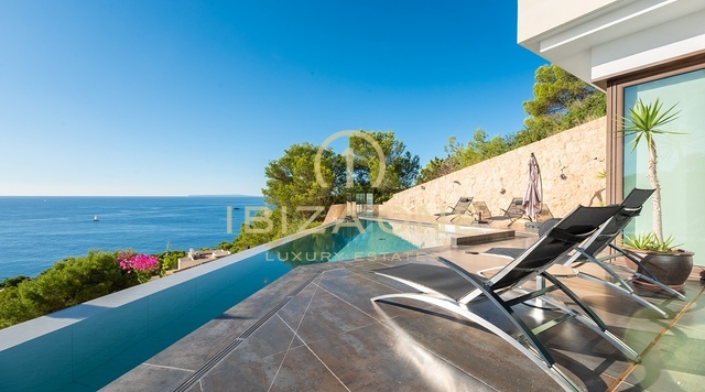 Luxury villa with panoramic sea views in an urbanization steps form the golf course for sale, Ibiza
