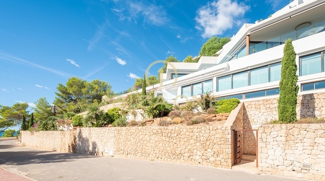 Luxury villa with panoramic sea views in an urbanization steps form the golf course for sale, Ibiza
