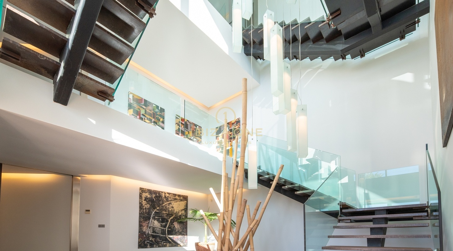 Luxury villa with panoramic sea views in an urbanization steps form the golf course for sale, Ibiza