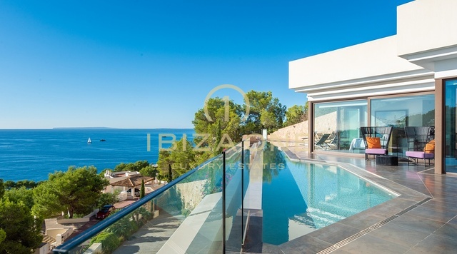 Luxury villa with panoramic sea views in an urbanization steps form the golf course for sale, Ibiza