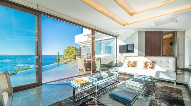 Luxury villa with panoramic sea views in an urbanization steps form the golf course for sale, Ibiza