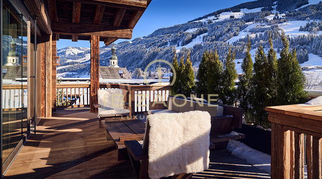 Vier exclusieve luxe chalets met moderne elegantie die directe toegang tot de pistes bieden te koop in Jochberg, Oostenrijk