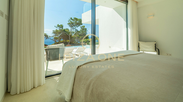 Modern First-Line Beachfront Villa with Private Sea Access for Long-Term Rent in Cap Martinet, Ibiza