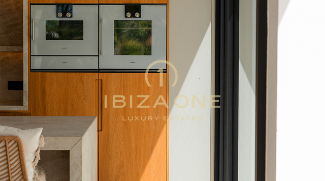 Villa de luxe neuve de designer avec vue sur mer, piscine privée et cuisine Gaggenau à vendre à Can Furnet, Ibiza