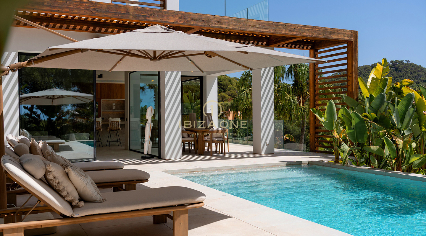 Villa de luxe neuve de designer avec vue sur mer, piscine privée et cuisine Gaggenau à vendre à Can Furnet, Ibiza