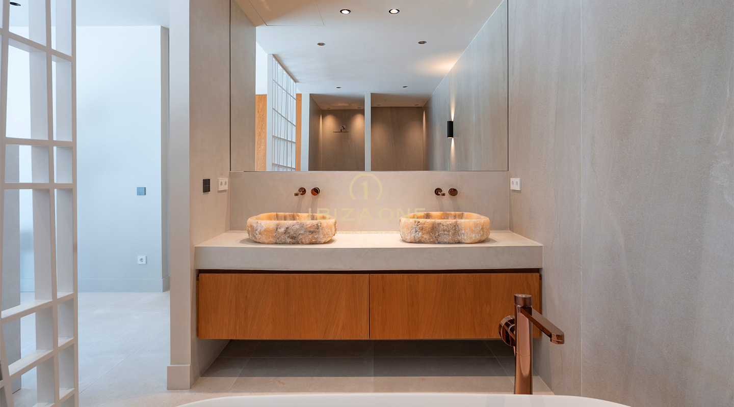 Villa de lujo de diseño a estrenar con vistas al mar, piscina privada y cocina Gaggenau en venta en Can Furnet, Ibiza.