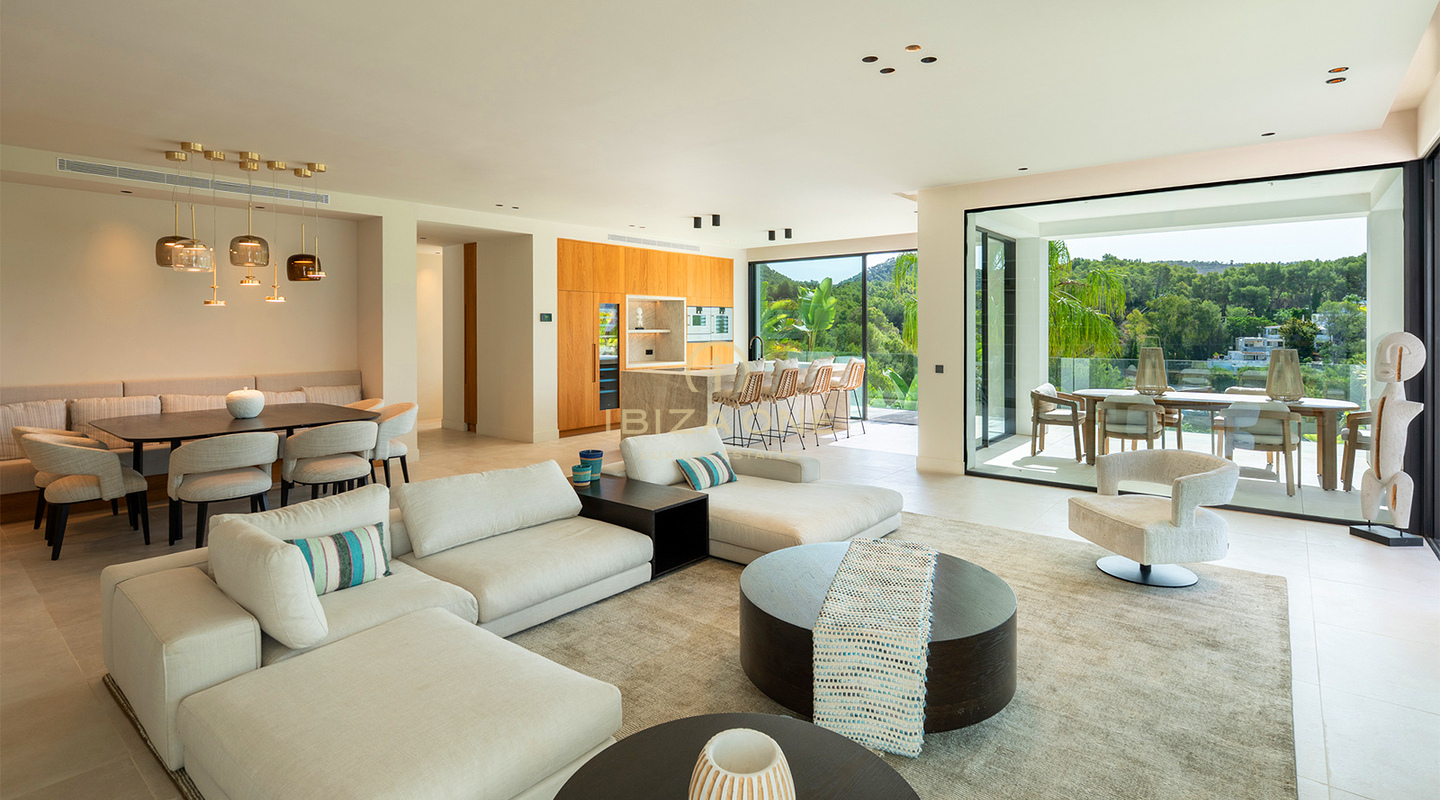 Villa de lujo de diseño a estrenar con vistas al mar, piscina privada y cocina Gaggenau en venta en Can Furnet, Ibiza.